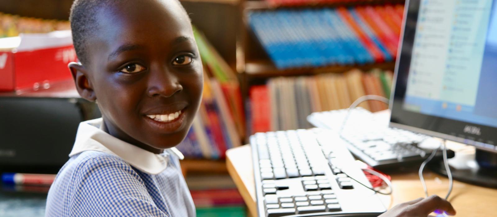Students use laptops to learn in Rwanda